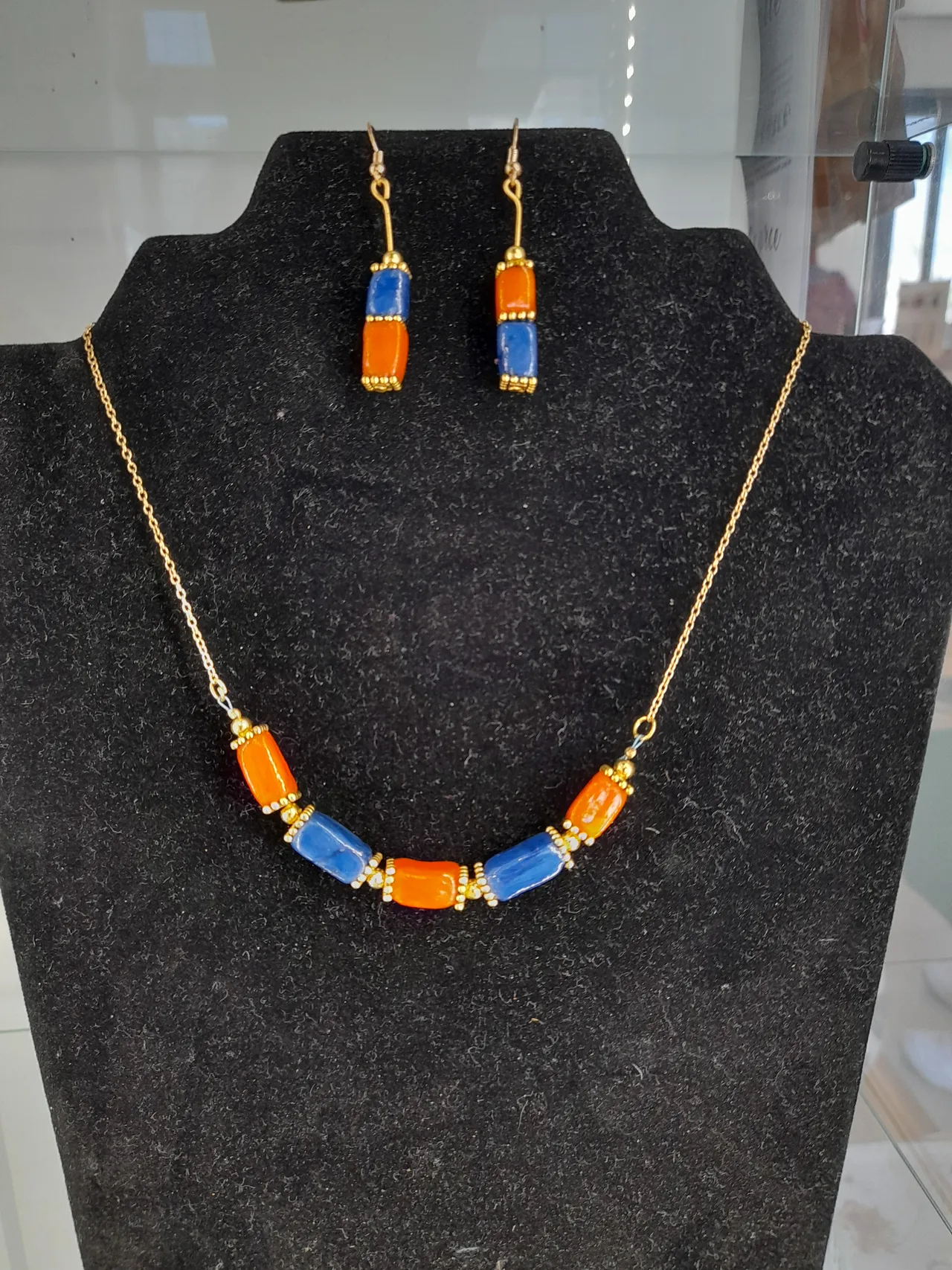 Parure Bleu et orange dorée